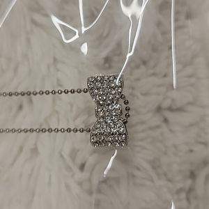 Absolutely adorable pave rhinestone bow on the middle of a tiny ball chain !!